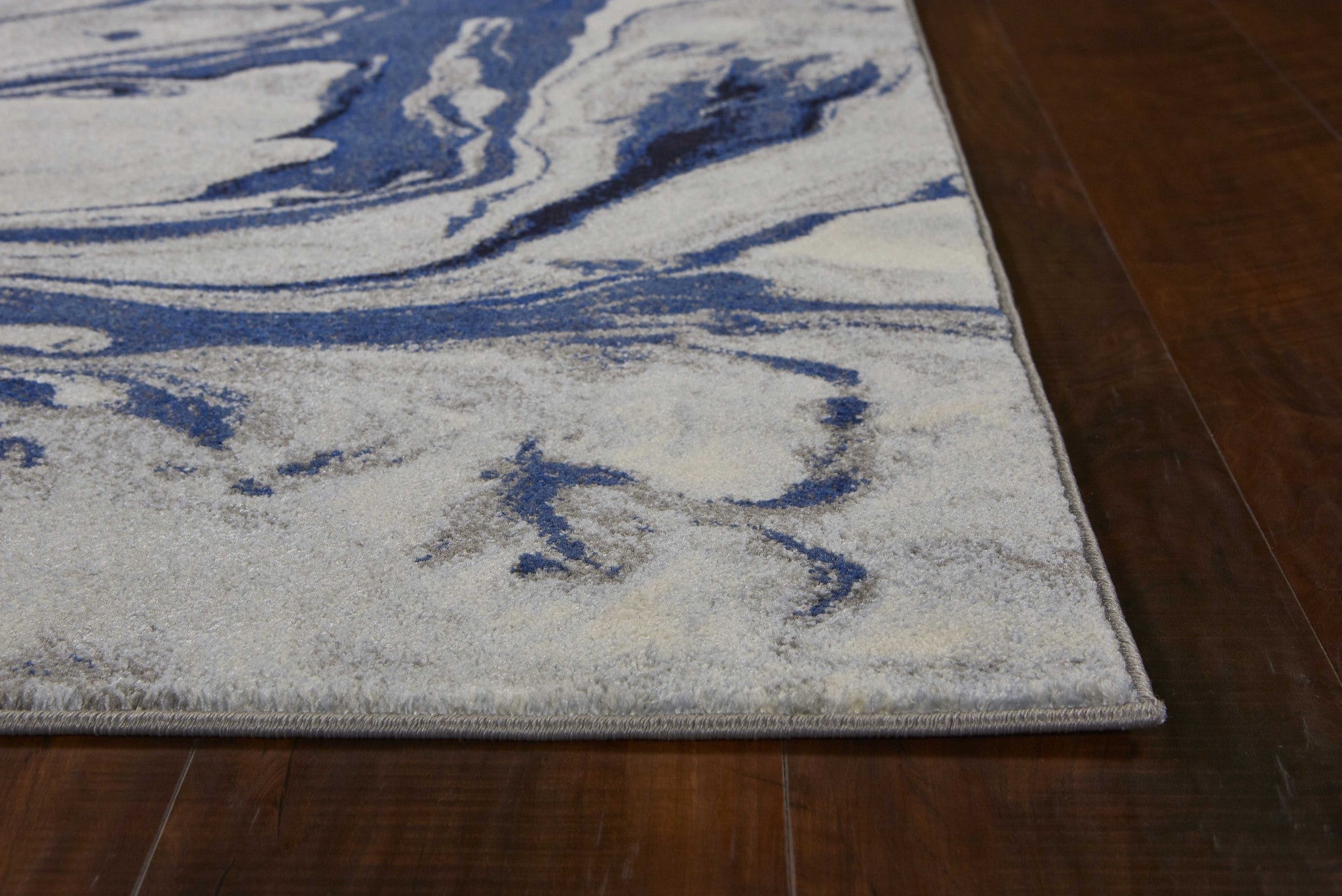 Blue and White Swirl Abstract Area Rug