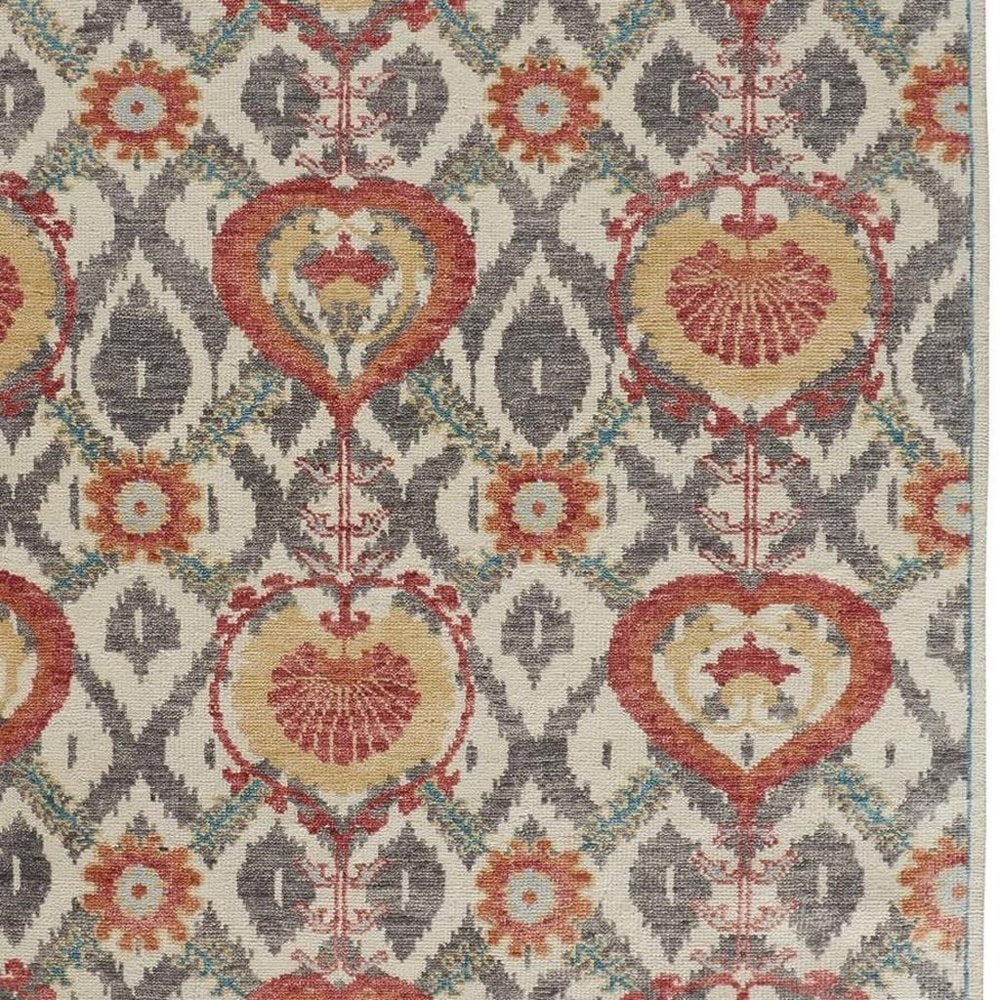 Orange and Ivory Floral Wool Hand Knotted Rug with Fringe